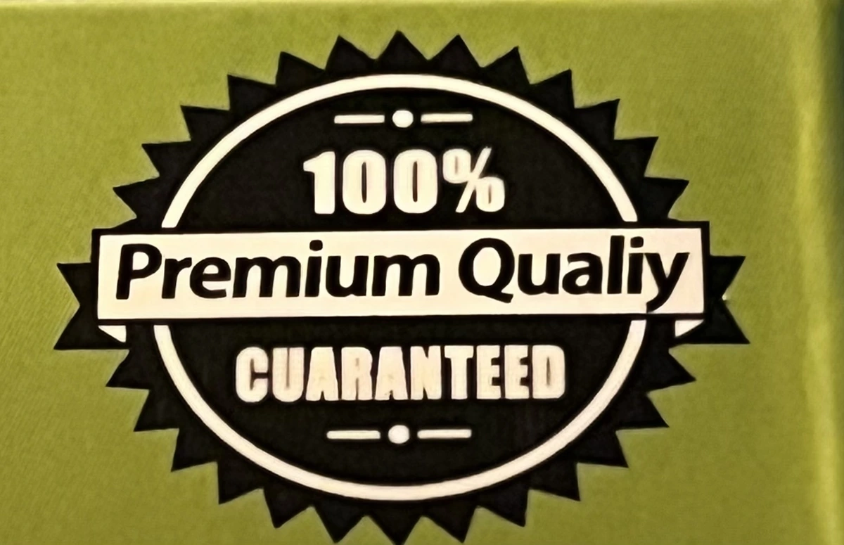 Printed badge on box reads: "100% Premium Qualily CAURANTEED". 