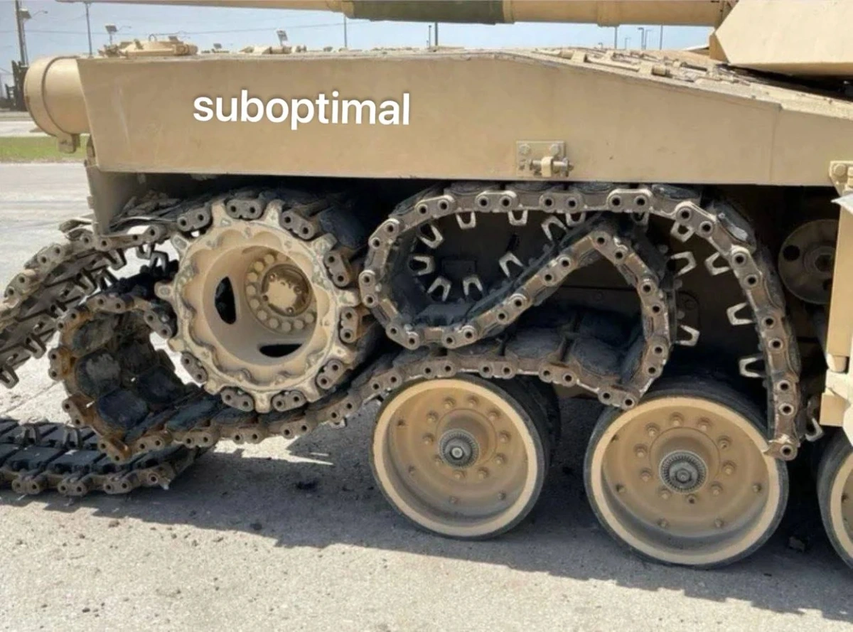 Picture of a tank of which the tracks are no longer connected and stuck in between tank and wheels labeled "suboptimal"